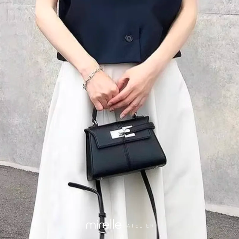 Sylvie – Trapezoidal Leather Day Clutch